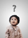 Adorable Intelligent Little Boy Thinking Question Mark