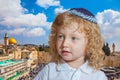 Adorable Jewish child with blond curls