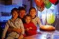 Adorable kid boy celebrating tenth birthday. Toddler Baby child, two kids boys brothers and father together with cake Royalty Free Stock Photo