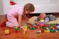 Adorable kids playing with blocks