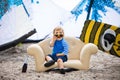 Adorable kiteboarder boy in the chair Royalty Free Stock Photo