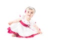 Adorable little baby girl playing in the studio, isolated on white background. Royalty Free Stock Photo