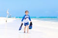 Little blond kid boy having fun on tropical beach of Bora Bora Royalty Free Stock Photo