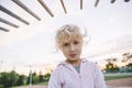 Adorable little blonde Caucasian girl child making funny silly face Royalty Free Stock Photo