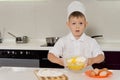 Adorable little boy pastry chef Royalty Free Stock Photo