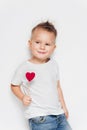 Adorable little boy posing with heart shape valentine Royalty Free Stock Photo