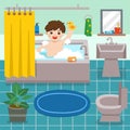 Adorable little boy taking a bath in bathtub with lot of soap lather and rubber duck.