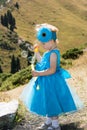 Adorable little child girl with bubble blower on grass on meadow. Summer green nature Royalty Free Stock Photo