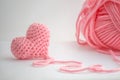 Adorable little crocheted heart and a skein of yarn