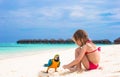 Adorable little girl at beach with big colorful Royalty Free Stock Photo