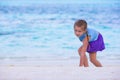 Adorable little girl at beach during summer