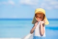 Adorable little girl at beach during summer