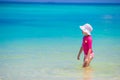 Adorable little girl at beach during summer