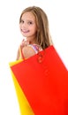 Adorable little girl child holding shopping colorful paper bags Royalty Free Stock Photo