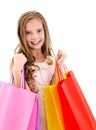 Adorable little girl child holding shopping colorful paper bags Royalty Free Stock Photo