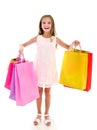 Adorable little girl child holding shopping colorful paper bags Royalty Free Stock Photo