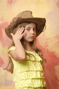 Adorable little girl with cute face in western cowboy hat Royalty Free Stock Photo