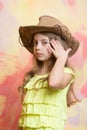 Adorable little girl with cute face in western cowboy hat Royalty Free Stock Photo