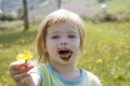 Adorable little girl eating chocolate Royalty Free Stock Photo