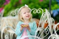 Adorable little girl eating fresh strawberry cake Royalty Free Stock Photo