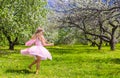 Adorable little girl have fun in blossoming apple Royalty Free Stock Photo