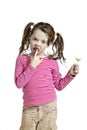 Adorable little girl with a lollipop Royalty Free Stock Photo