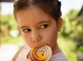 Adorable little girl with lollipop Royalty Free Stock Photo