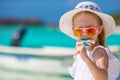 Adorable little girl with lollipop on tropical Royalty Free Stock Photo