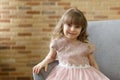 Adorable little girl looking at camera at home Royalty Free Stock Photo