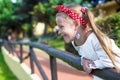 Adorable little girl outdoors during summer