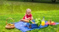 Adorable little girl on picnic outdoor near the Royalty Free Stock Photo