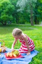 Adorable little girl on picnic outdoor near the Royalty Free Stock Photo