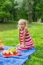 Adorable little girl on picnic outdoor near the Royalty Free Stock Photo