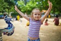 Adorable little girl on playground on a sunny day. Preschooler child playing outdoors Royalty Free Stock Photo