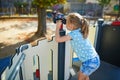 Adorable little girl on playground on a sunny day Royalty Free Stock Photo