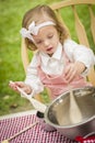 Adorable Little Girl Playing Chef Cooking Royalty Free Stock Photo