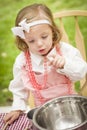 Adorable Little Girl Playing Chef Cooking Royalty Free Stock Photo