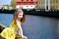 Adorable little girl playing by a river on a beautiful summer day Royalty Free Stock Photo