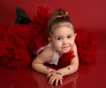 Adorable little girl in red pettiskirt tutu