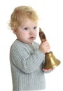 Adorable little girl rings the bell