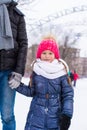 Adorable little girl skating on the ice-rink Royalty Free Stock Photo