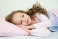 Adorable little girl sleeping in her bed Royalty Free Stock Photo