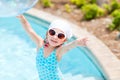 Adorable little girl at swimming pool Royalty Free Stock Photo