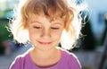 Adorable little girl taken closeup outdoors