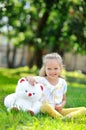 Adorable little girl with a toy bear Royalty Free Stock Photo