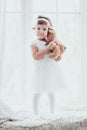 Adorable Little Girl with Toy Winter Photoshoot