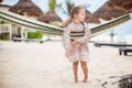 Adorable little girl on tropical vacation relaxing Royalty Free Stock Photo