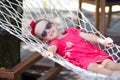 Adorable little girl on tropical vacation relaxing Royalty Free Stock Photo