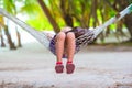 Adorable little girl on tropical vacation relaxing Royalty Free Stock Photo