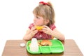 Adorable Little Girl Unhappy with School Lunch